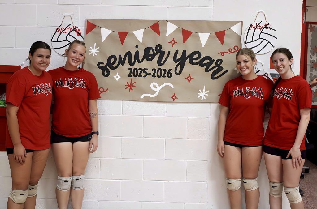 Ella Mattas, Avery Cornwell, Anna Daugherty, & Addy Ross led Marshall to a thrilling 3-set win on Senior Night over Lawrenceville/Photo by T Ray Henry.