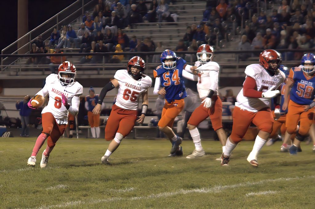 Kaiden Sanders (8) broke open the game at Newton with an 81-yard touchdown run.