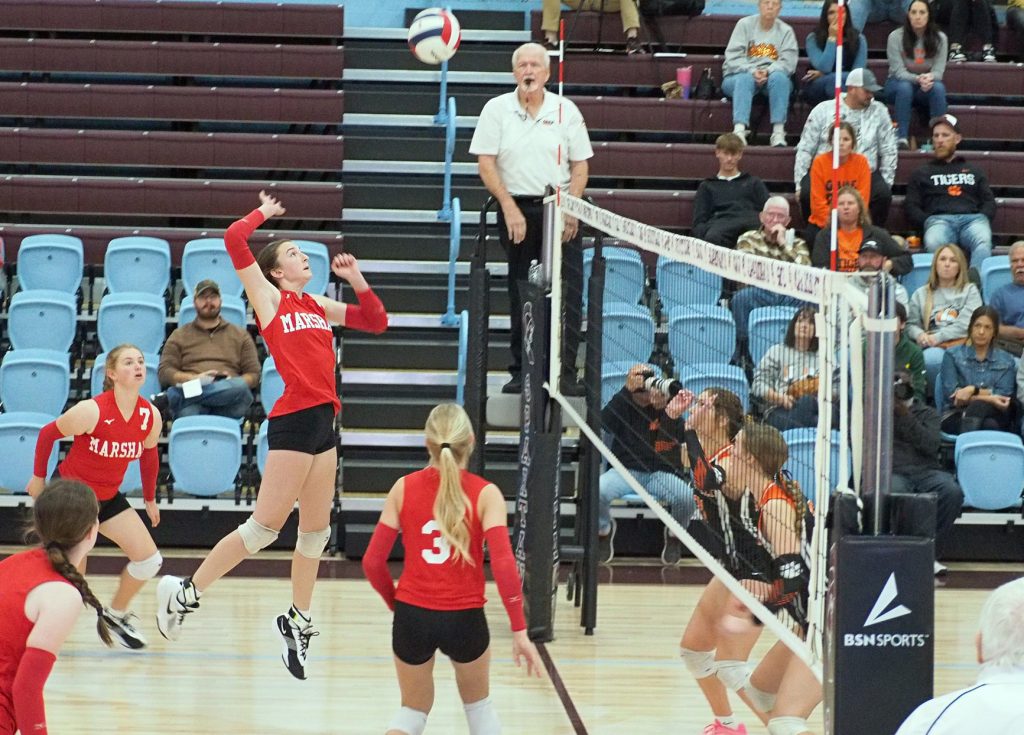 Lilly Ross rises up to drill a kill against Westville in the state tournament.